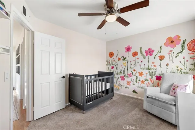 a bedroom with furniture and a couch