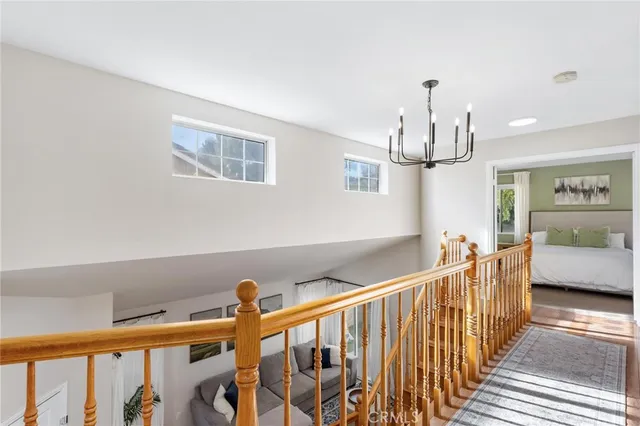 a view of a house with swimming pool and porch