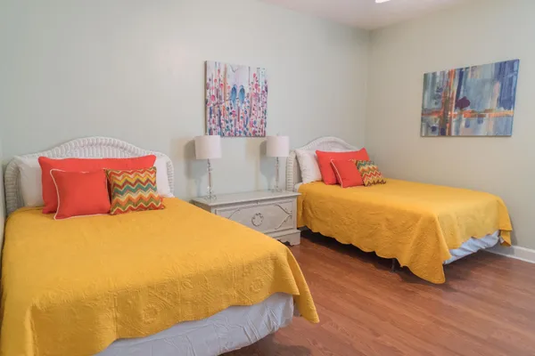 a bedroom with bed and a window