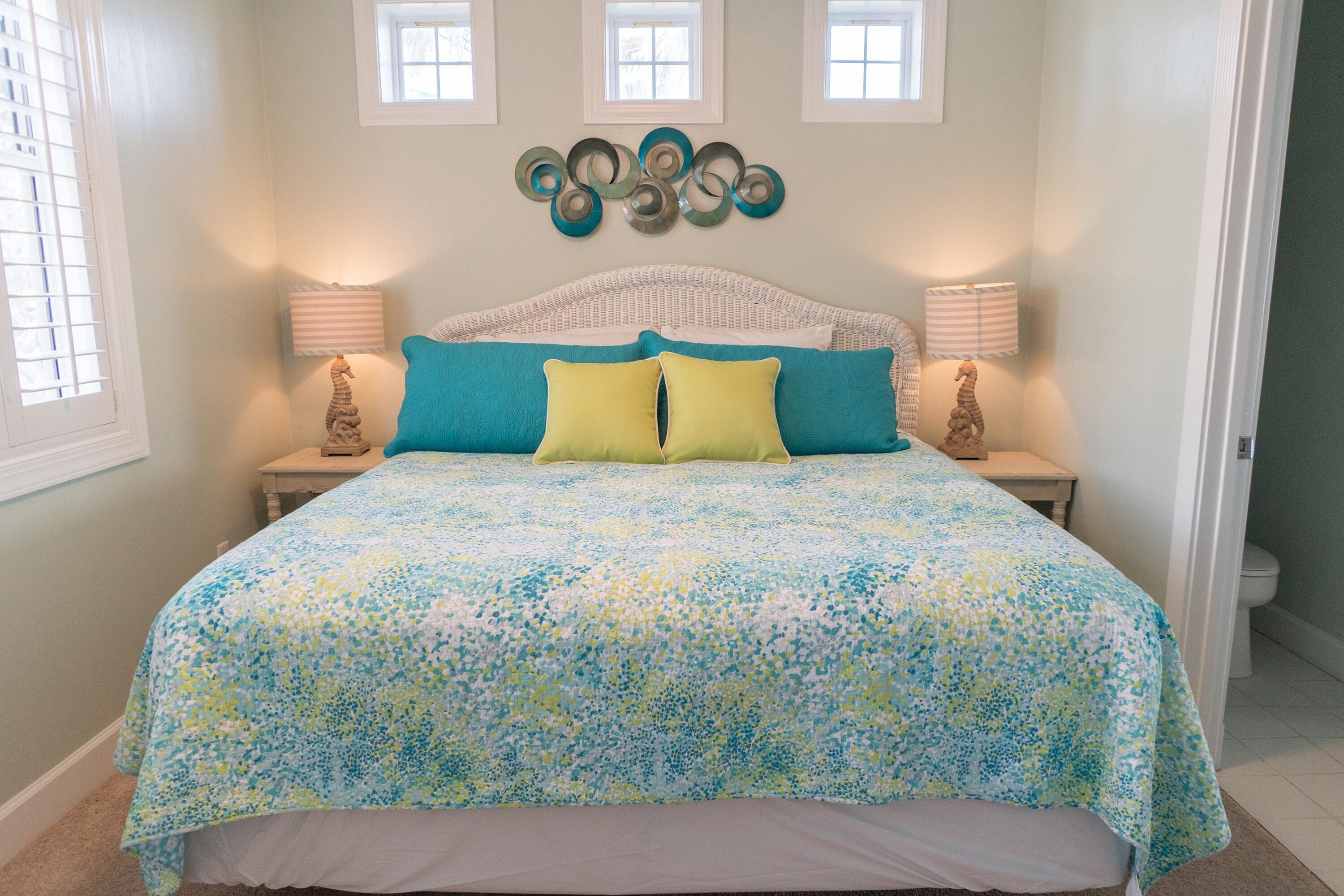 223 Paradise By The Sea Boulevard Inlet Beach, FL 32461 - Photo 21 of 35 a bedroom with a bed and windows