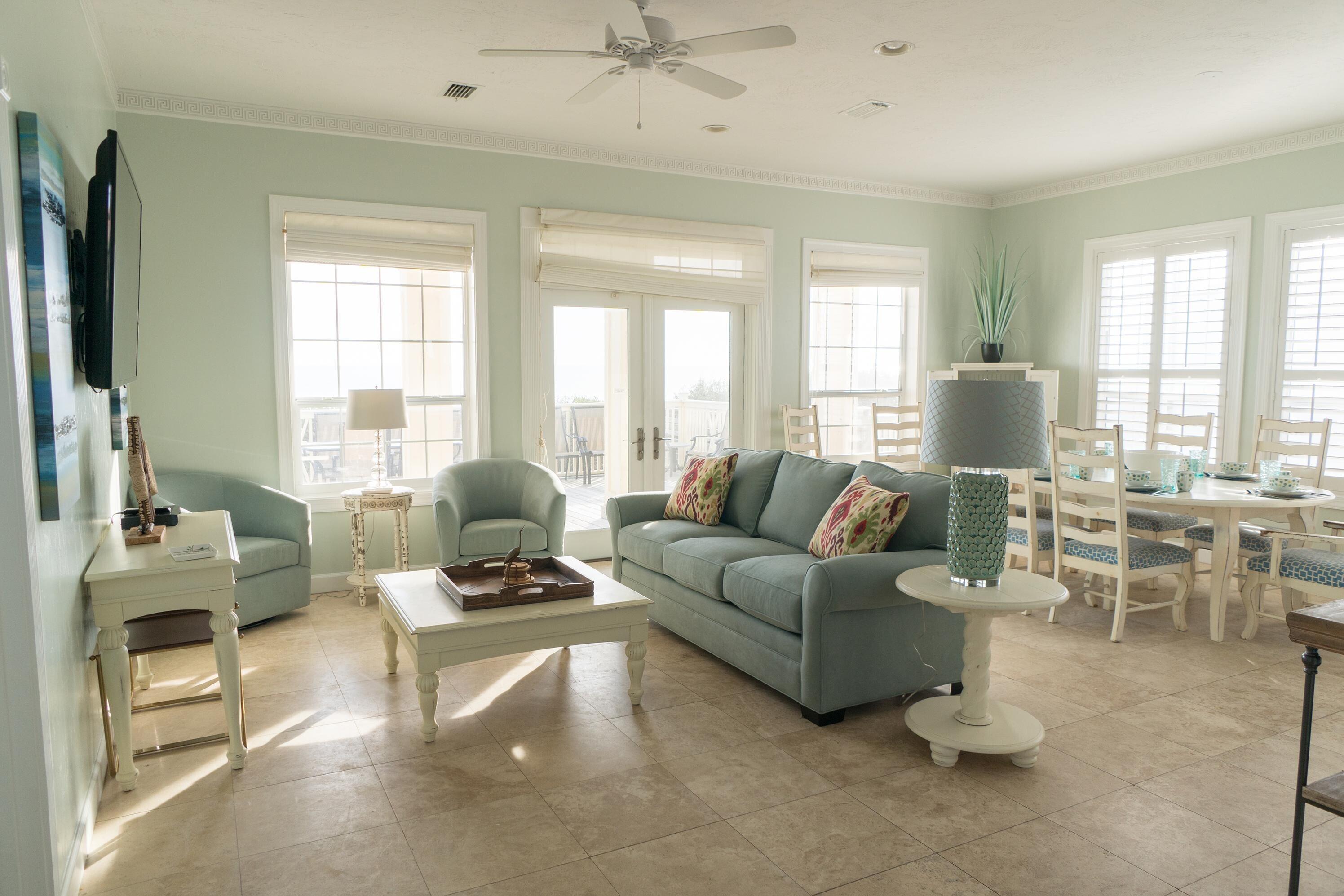 223 Paradise By The Sea Boulevard Inlet Beach, FL 32461 - Photo 6 of 35 a living room with furniture and a large window