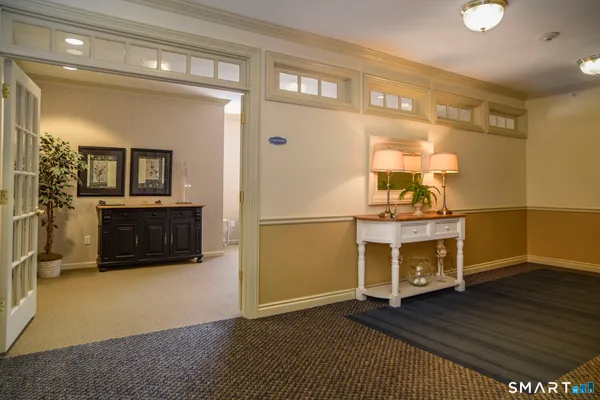 a view of a living room with a wooden floor