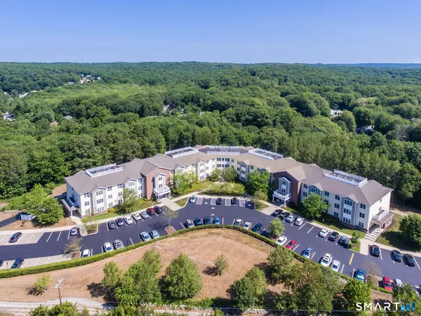an aerial view of a house with a garden