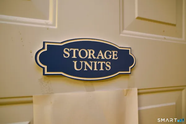 a blue sign that is on the wall