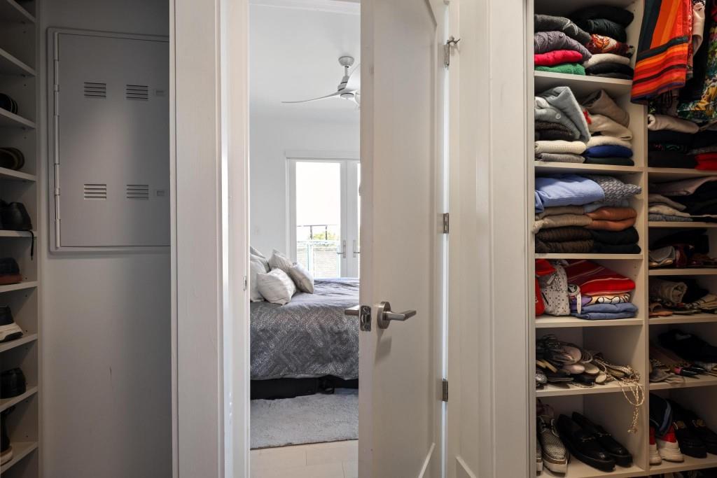 775 Juniper Street Northeast, Unit 602 Atlanta, GA 30308 - Photo 17 of 40 a view of a bedroom with a closet
