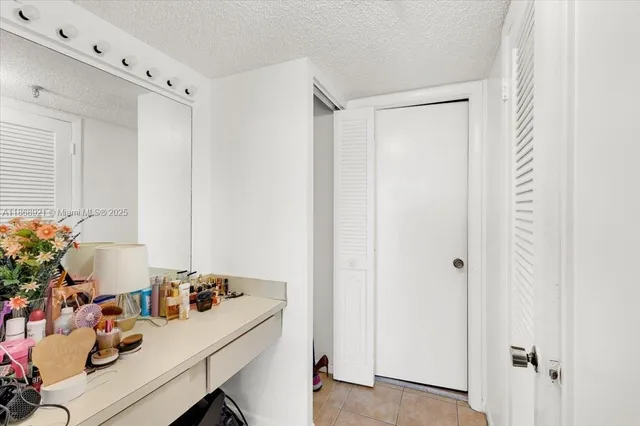 a room with a table and chairs in it