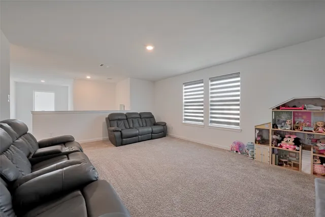 a living room with furniture and a couch