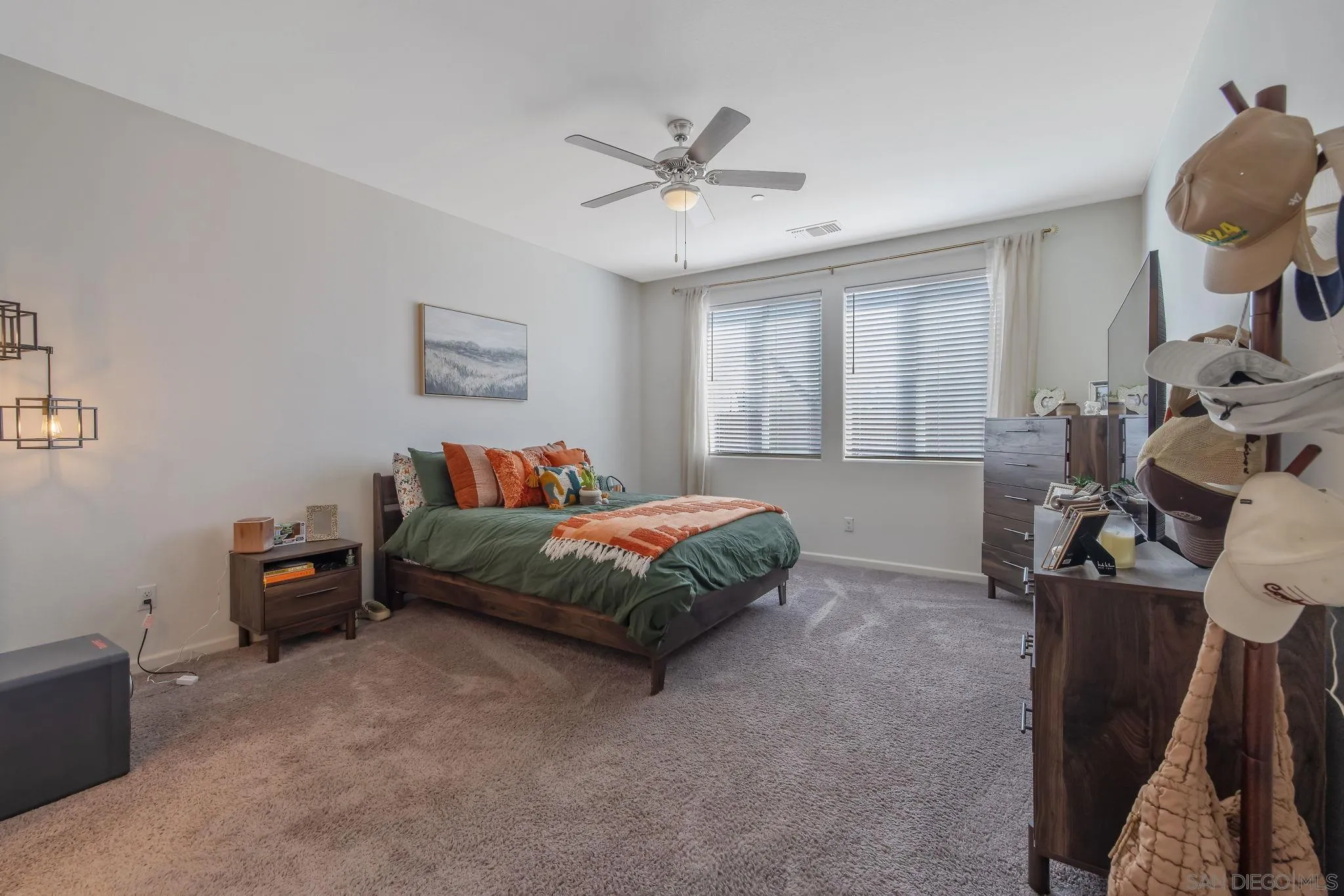 495 Pearl Drive Lemoore, CA 93245 - Photo 31 of 45 a bedroom with a bed window and dresser