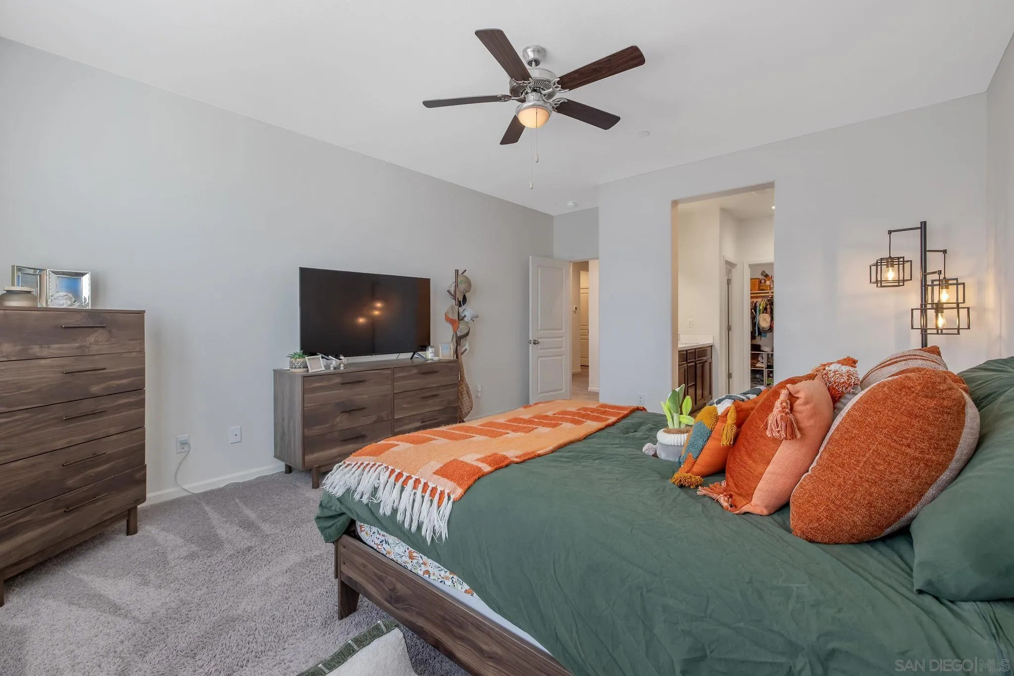 495 Pearl Drive Lemoore, CA 93245 - Photo 32 of 45 a bedroom with a bed and a television