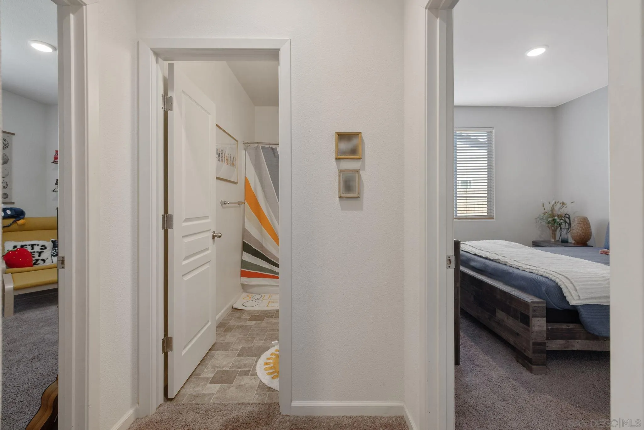 495 Pearl Drive Lemoore, CA 93245 - Photo 8 of 45 a room that has a bed and a window in it