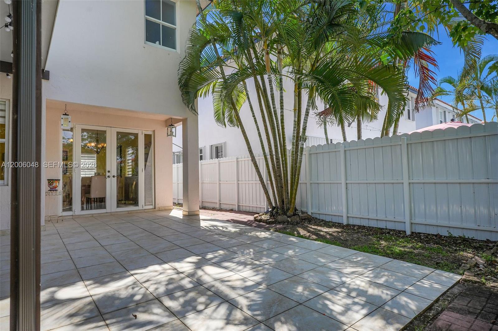 6114 Southwest 158th Pass Miami, FL 33193 - Photo 33 of 37 a view of a house with a yard