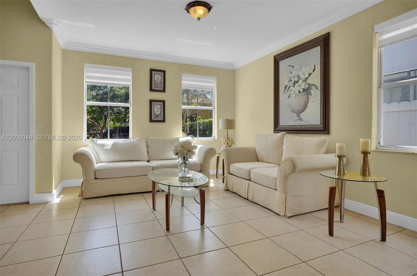 6114 Southwest 158th Pass Miami, FL 33193 - Photo 5 of 37 a living room with furniture and a window