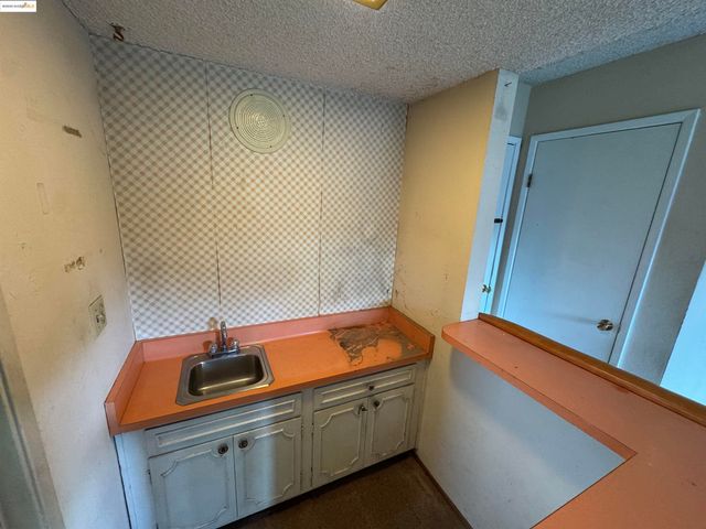 a view of an empty room with window