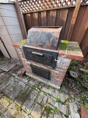 a house that has a tree in front of it