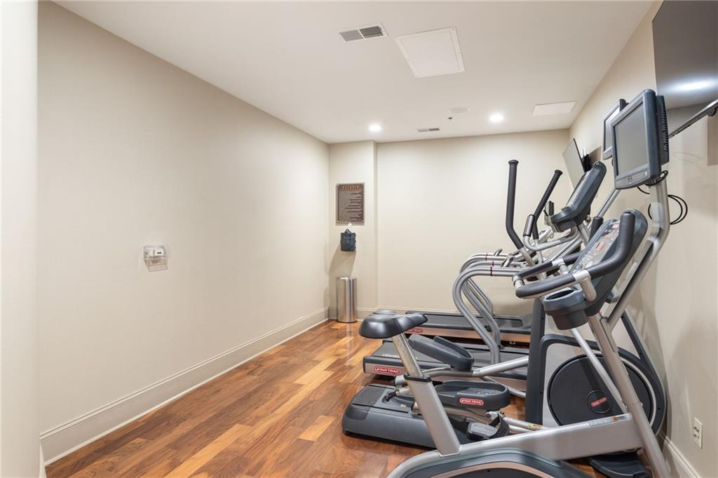 2255 Peachtree Road Northeast, Unit 326 Atlanta, GA 30309 - Photo 27 of 37 a view of a room with gym equipment