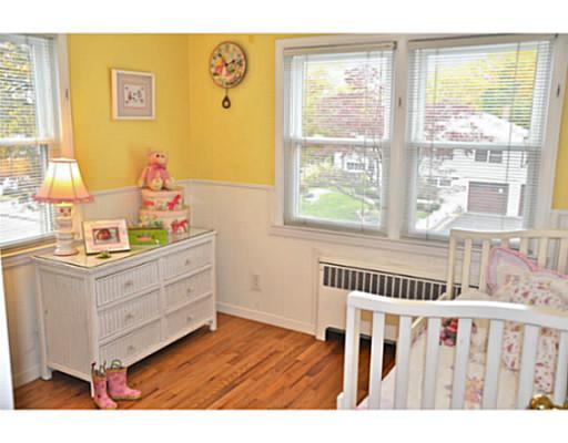 4 Mary Lane Riverside, CT 06878 - Photo 7 of 10 a bedroom with furniture and a window