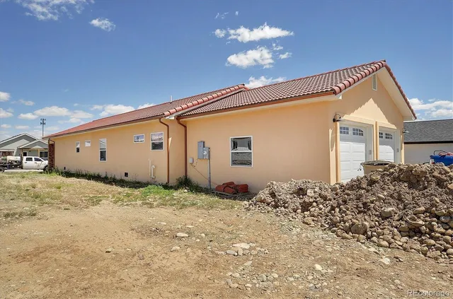 a view of a house with a snow