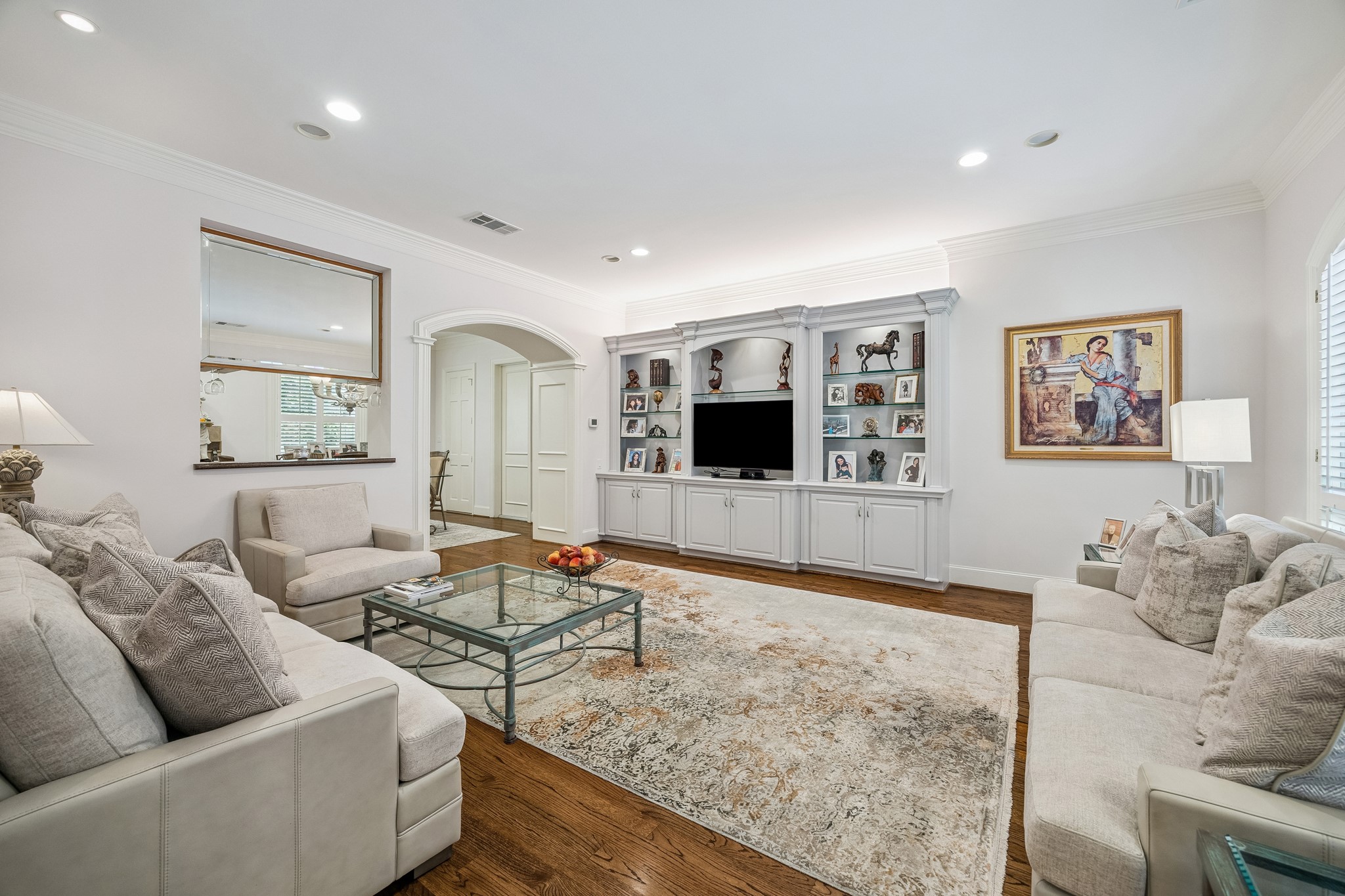 5043 Tangle Lane Houston, TX 77056 - Photo 16 of 50 a living room with furniture and a flat screen tv