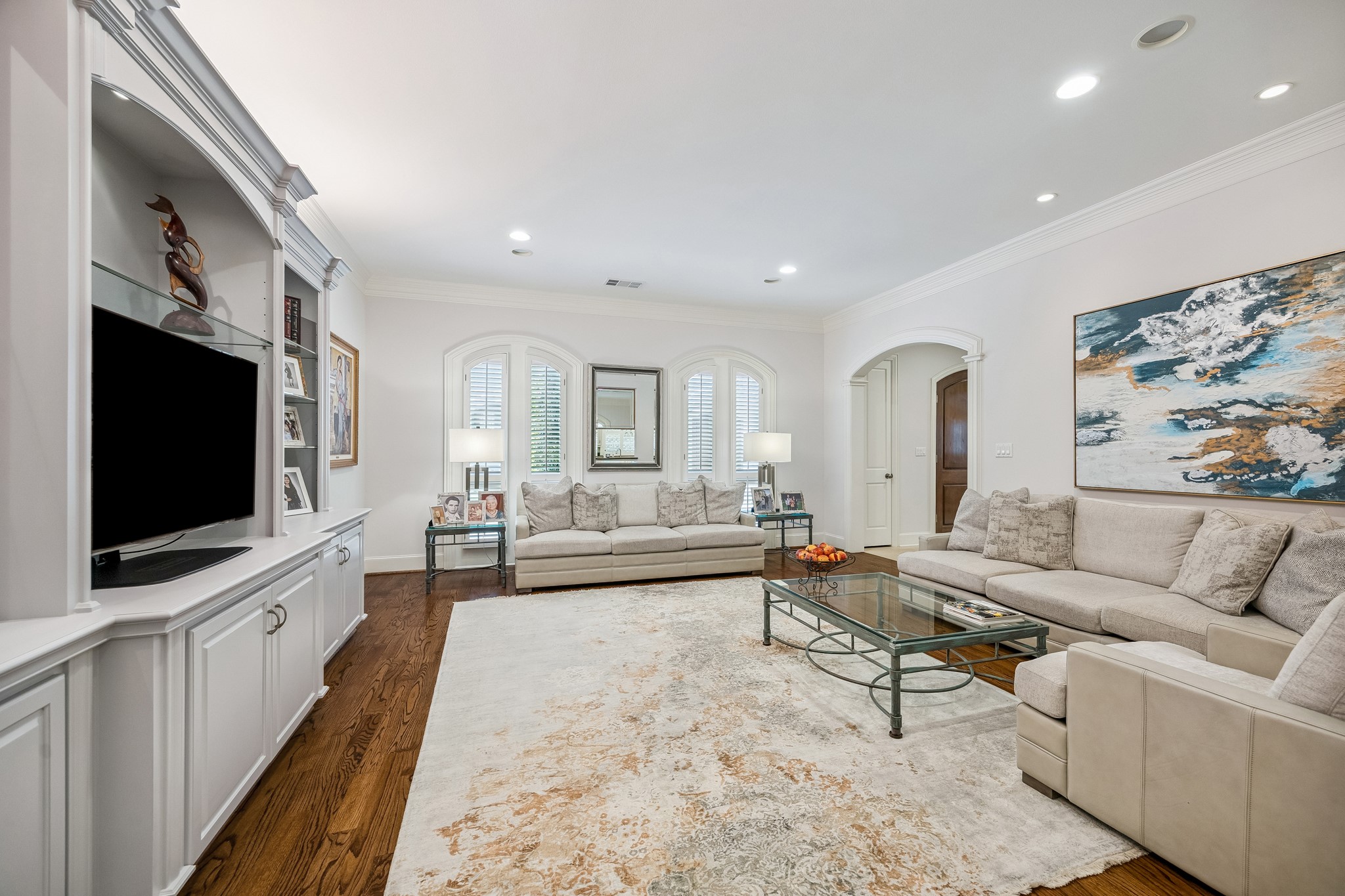 5043 Tangle Lane Houston, TX 77056 - Photo 17 of 50 a living room with furniture and a flat screen tv