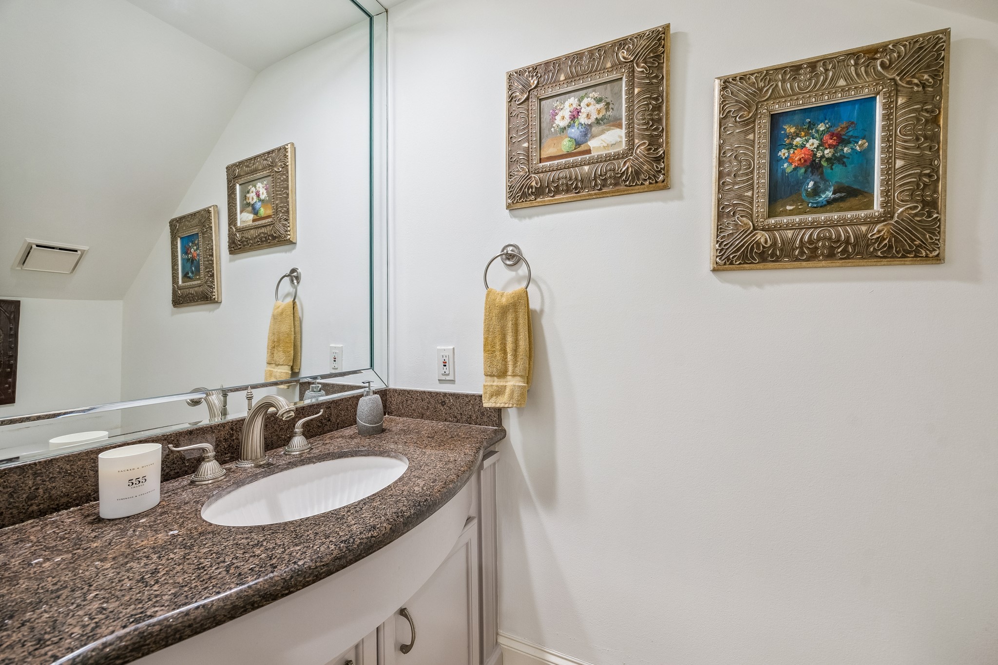 5043 Tangle Lane Houston, TX 77056 - Photo 18 of 50 a bathroom with a granite countertop sink and a mirror
