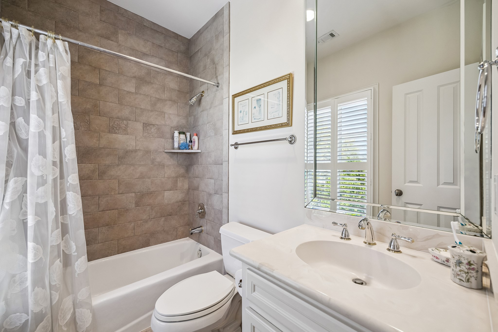 5043 Tangle Lane Houston, TX 77056 - Photo 26 of 50 a bathroom with a sink toilet and shower