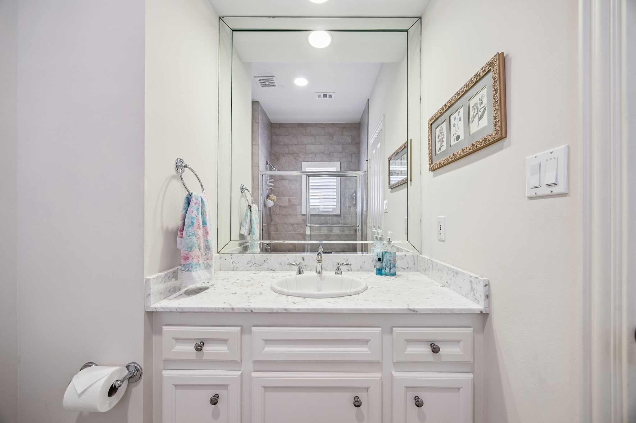 5043 Tangle Lane Houston, TX 77056 - Photo 28 of 50 a bathroom with a sink vanity and a mirror