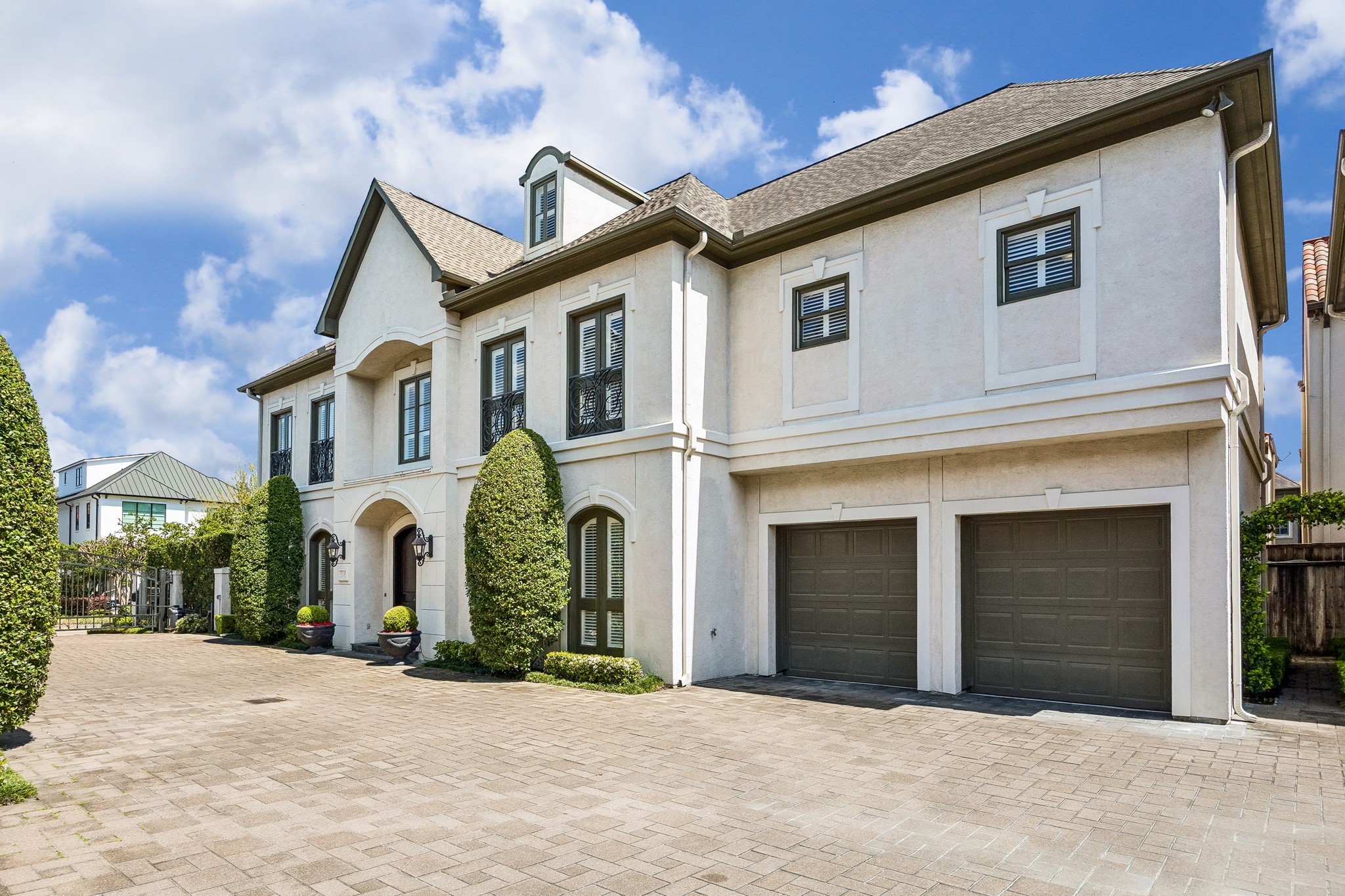 5043 Tangle Lane Houston, TX 77056 - Photo 35 of 50 a front view of a house with a yard and garage