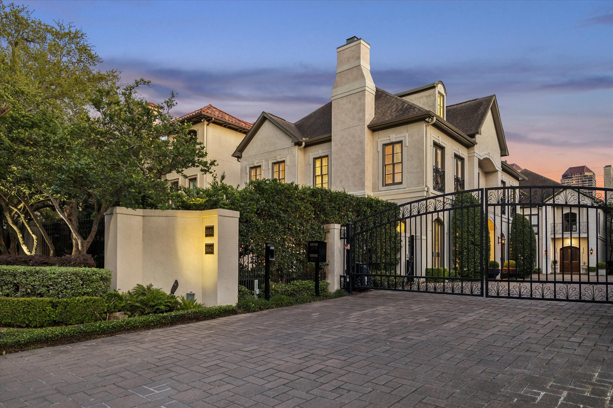 5043 Tangle Lane Houston, TX 77056 - Photo 45 of 50 a front view of a house with a yard and garage