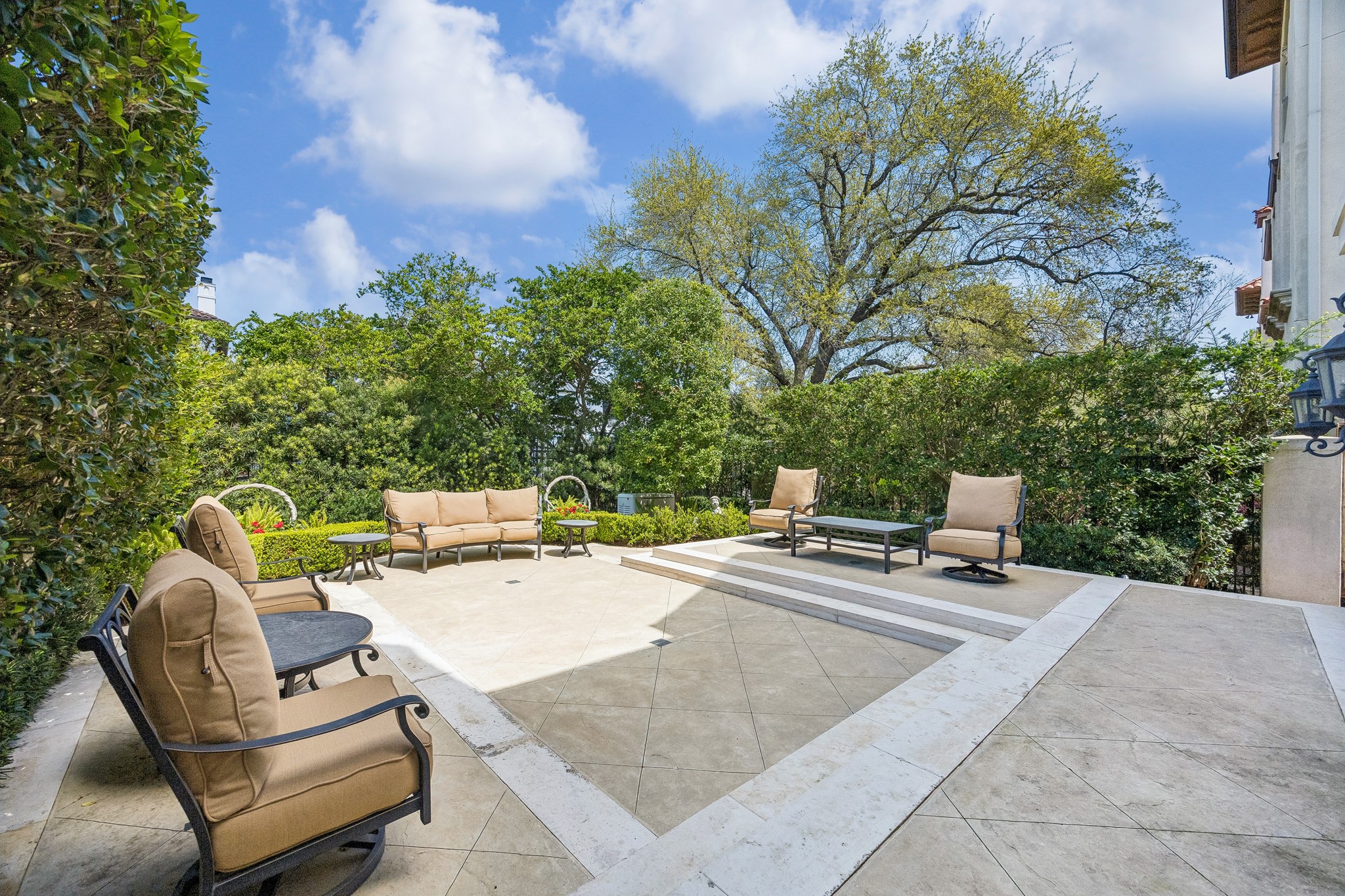 5043 Tangle Lane Houston, TX 77056 - Photo 9 of 50 a view of backyard with seating space and trees in the background