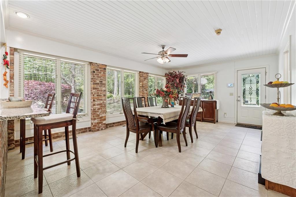 1387 Springdale Road Gainesville, GA 30501 - Photo 12 of 46 a view of a dining room with furniture window and outside view