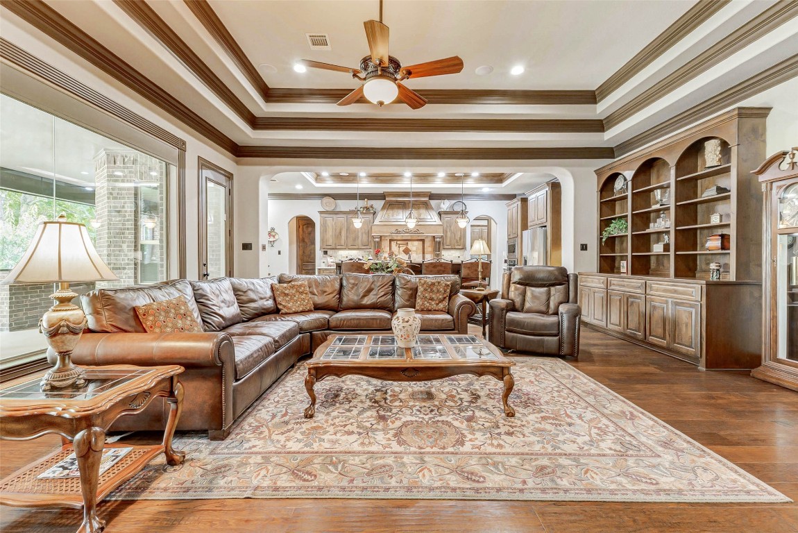 4315 Wickby Street Fulshear, TX 77441 - Photo 13 of 46 a living room with furniture and a large window