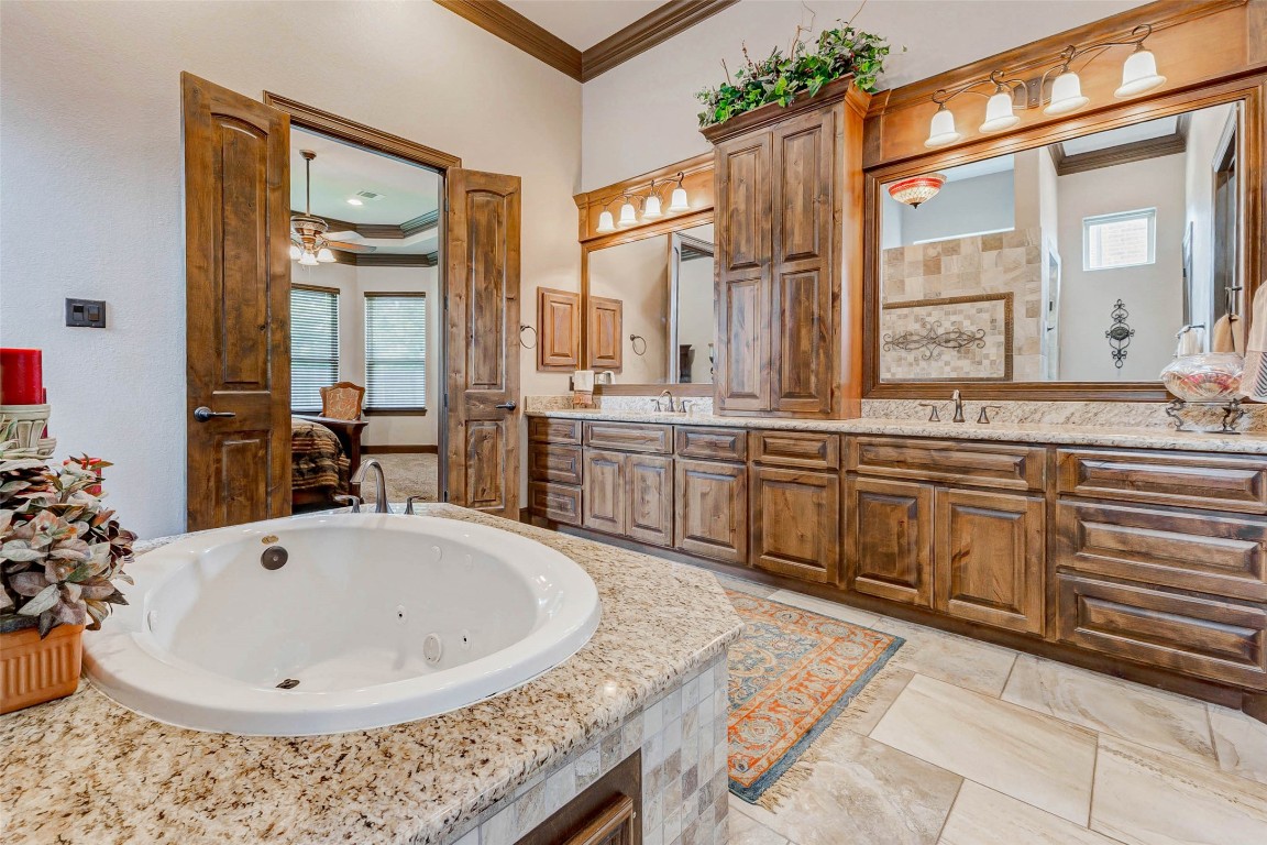 4315 Wickby Street Fulshear, TX 77441 - Photo 30 of 46 Large jetted soaking tub with granite surround.