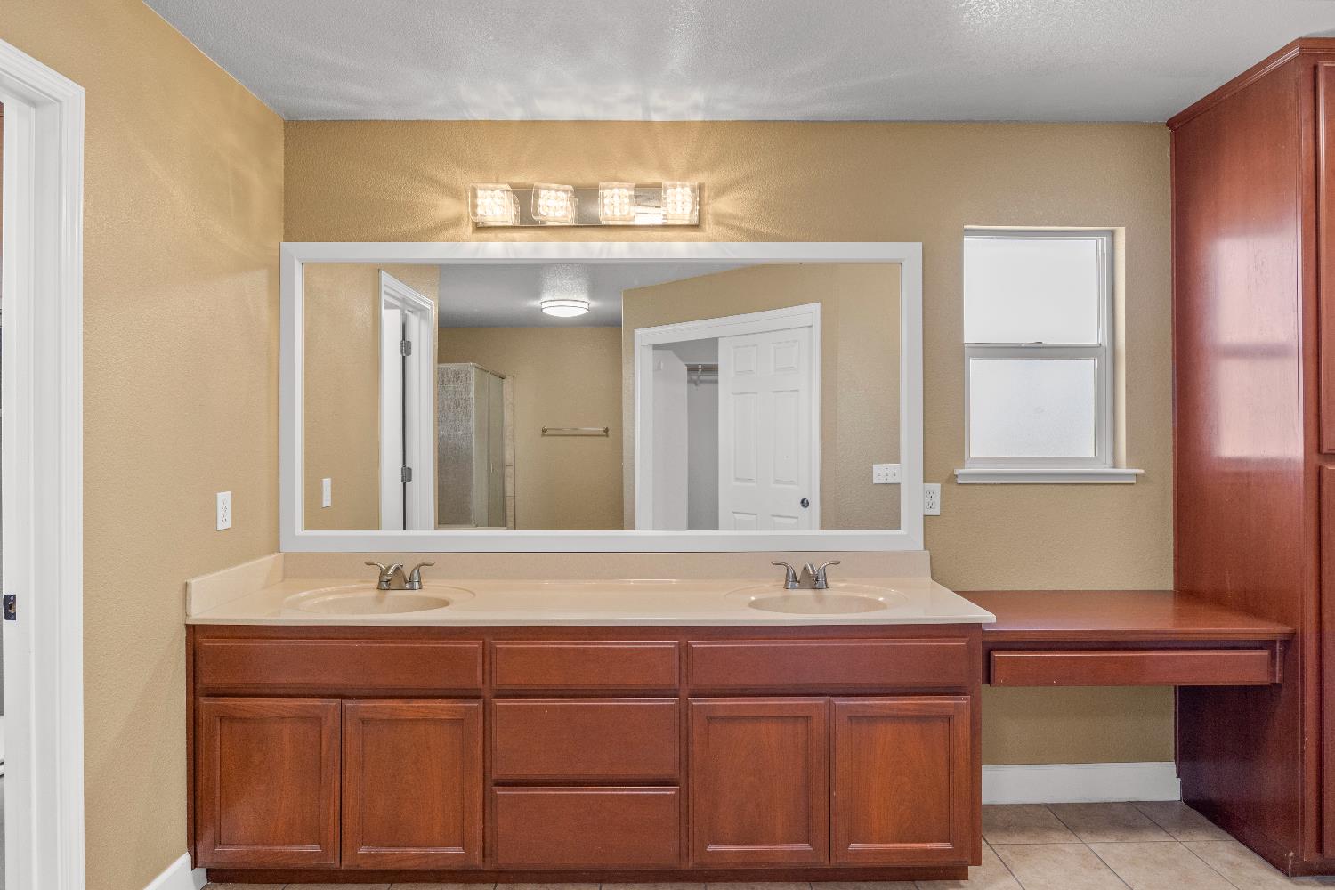 637 Rebekah Court Ripon, CA 95366 - Photo 53 of 69 a bathroom with a sink and a mirror