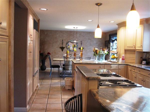 101 Hampton Road Sharon, MA 02067 - Photo 5 of 29 a kitchen with stainless steel appliances granite countertop a sink a stove and a refrigerator