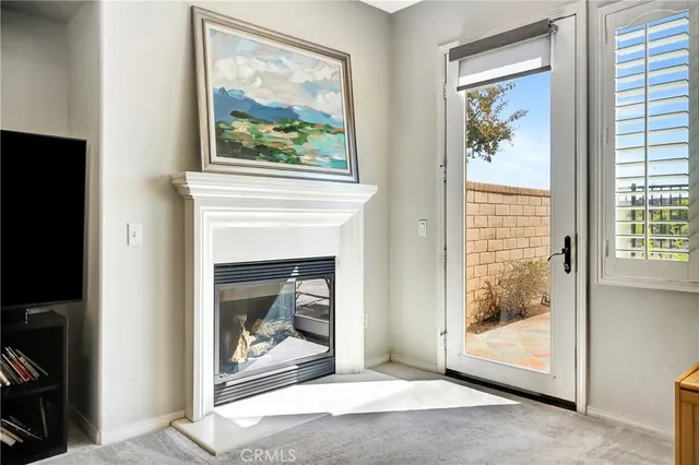 a kitchen with stainless steel appliances granite countertop a refrigerator and a stove