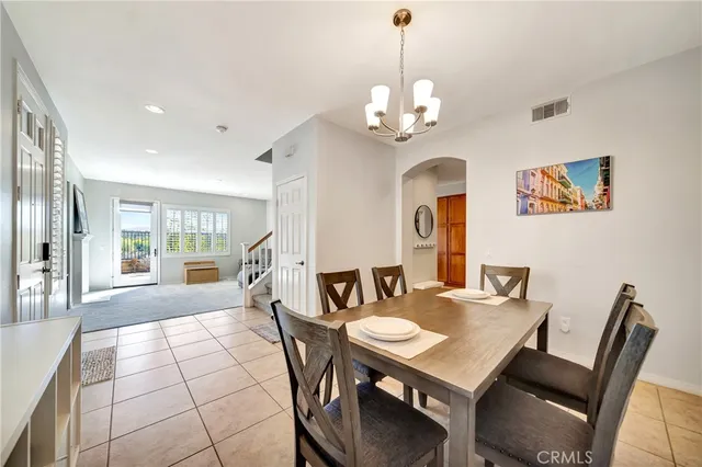 a bedroom with a bed and a desk