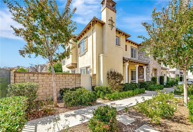 front view of a house with a small yard