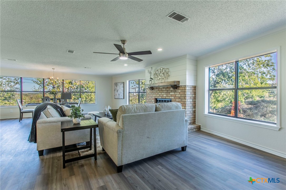 608 Ridgecrest Drive Salado, TX 76571 - Photo 8 of 43 a living room with furniture and a large window