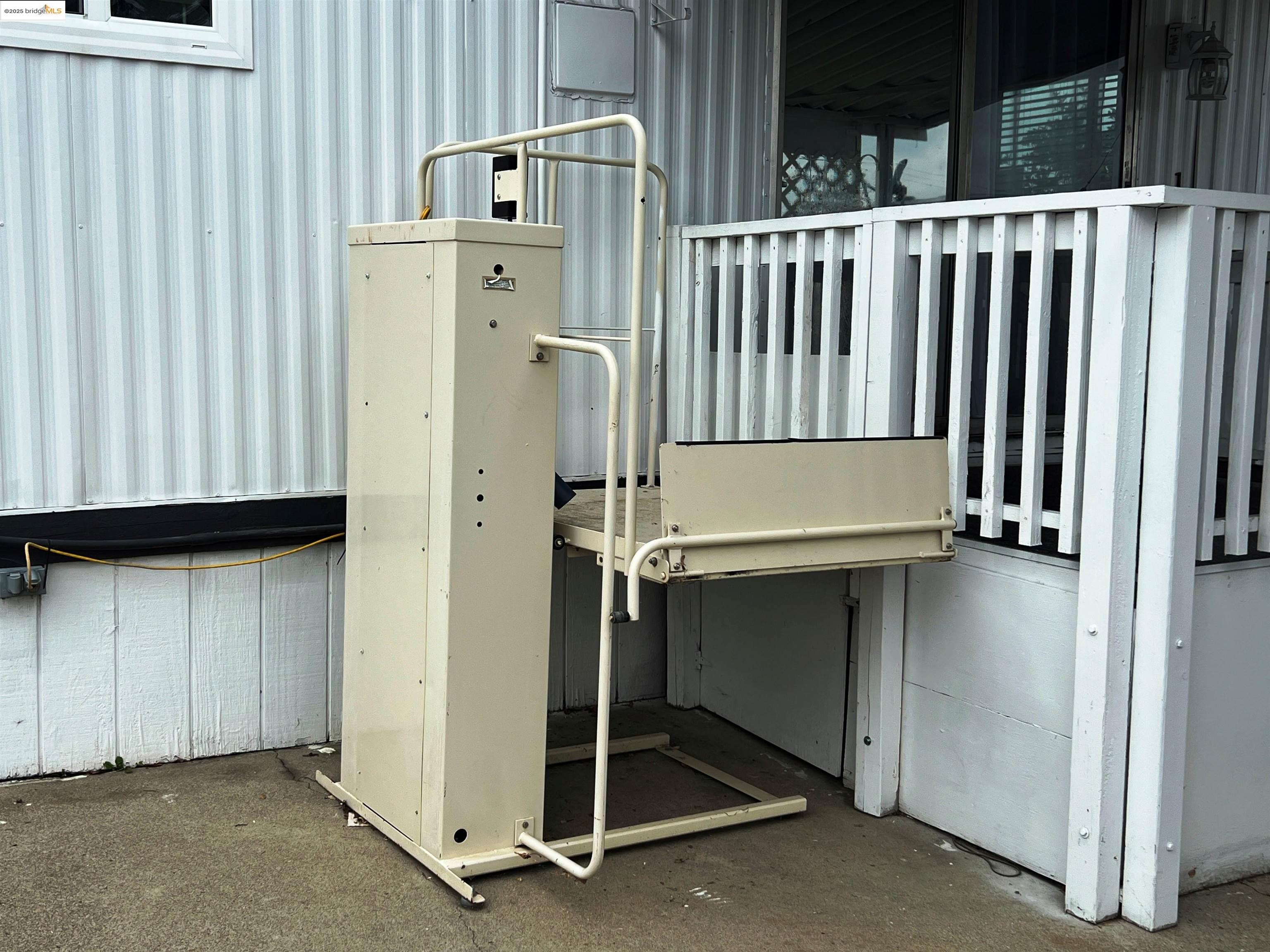 210 West Cypress Road, Unit 1 Oakley, CA 94561 - Photo 4 of 16 a kitchen with a refrigerator and white cabinets