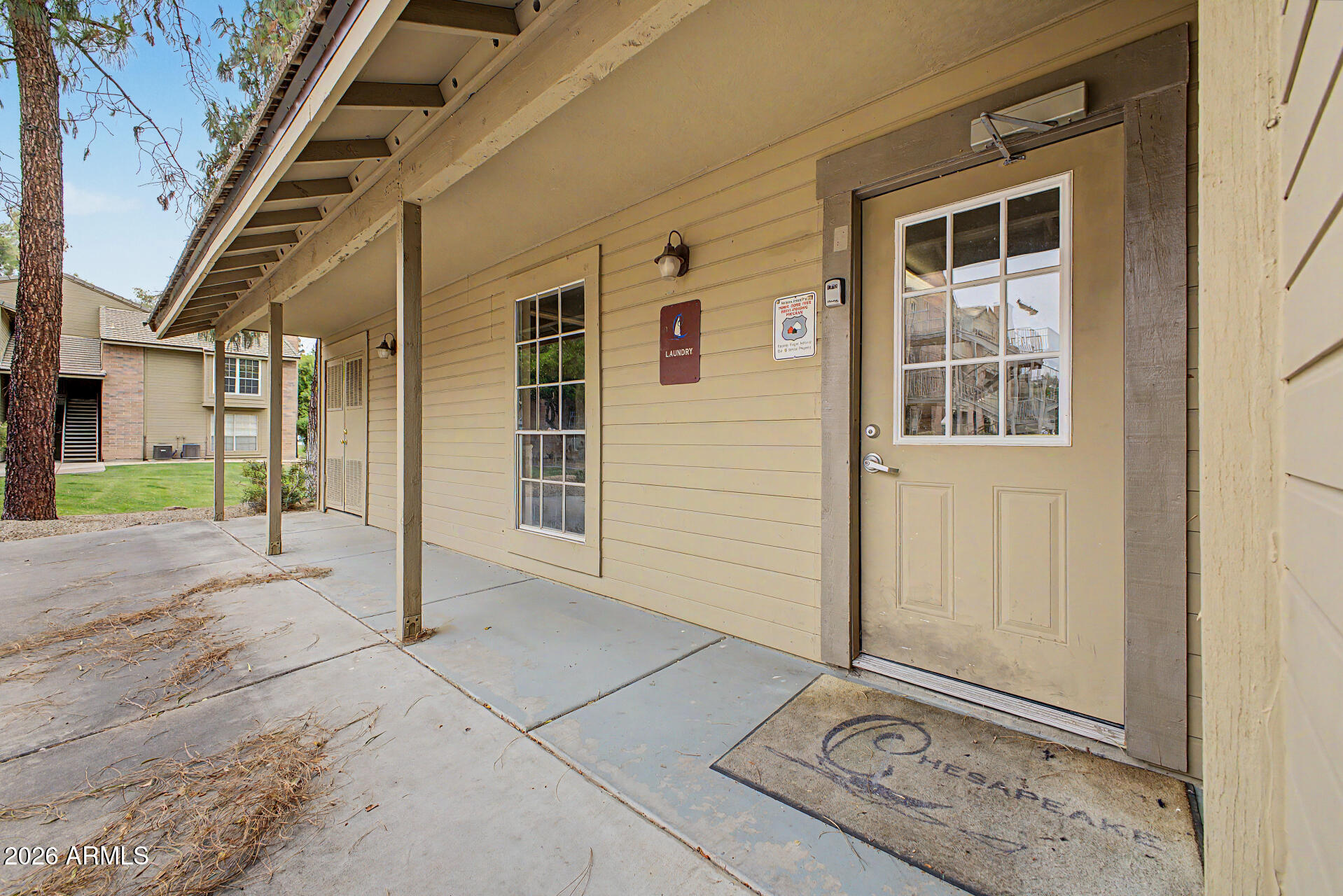 200 East Southern Avenue, Unit 224 Tempe, AZ 85282 - Photo 22 of 30 front view of a house with a glass door