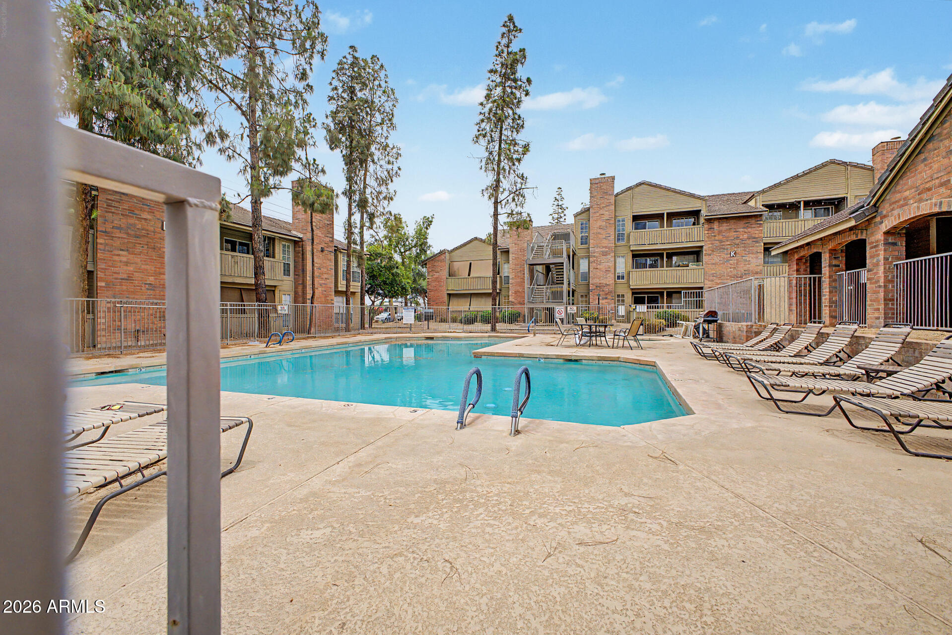 200 East Southern Avenue, Unit 224 Tempe, AZ 85282 - Photo 26 of 30 a view of swimming pool with outdoor seating and plants
