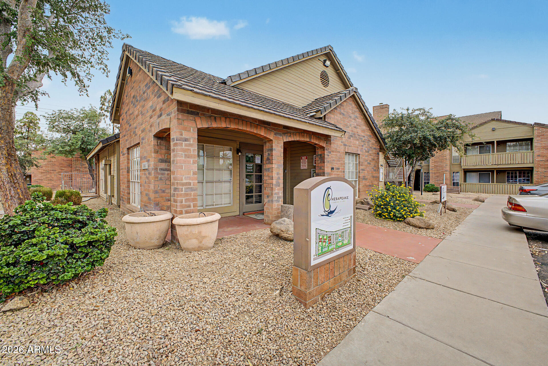 200 East Southern Avenue, Unit 224 Tempe, AZ 85282 - Photo 27 of 30 a front view of a house with garden