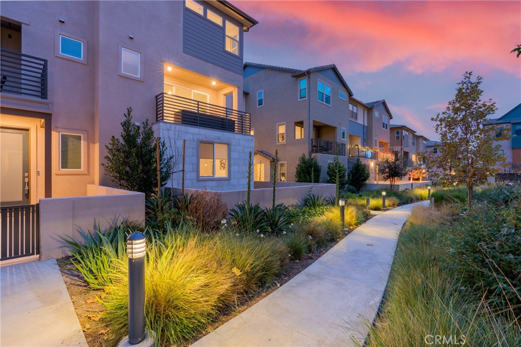 125 Pattern Irvine, CA 92618 - Photo 2 of 38 a view of a house with a garden and pathway