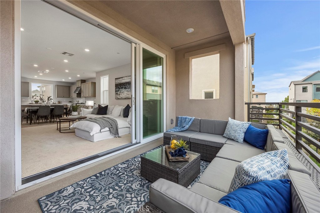 125 Pattern Irvine, CA 92618 - Photo 22 of 38 a living room with furniture kitchen view and a large window