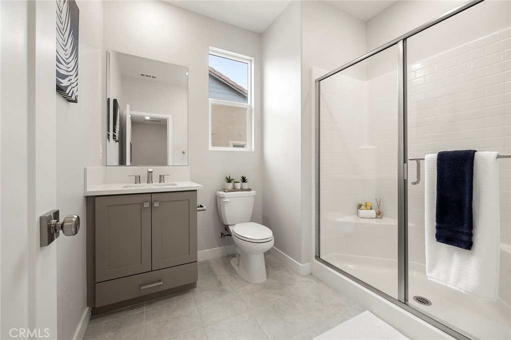 125 Pattern Irvine, CA 92618 - Photo 26 of 38 a bathroom with a toilet sink and shower