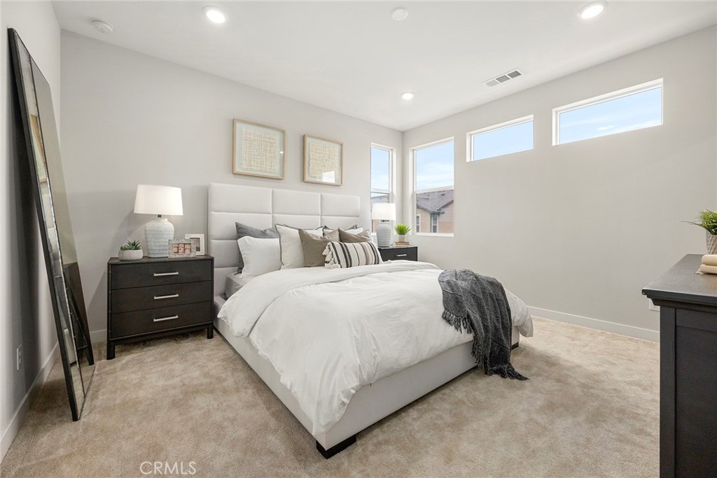 125 Pattern Irvine, CA 92618 - Photo 28 of 38 a bedroom with a bed and a night stand