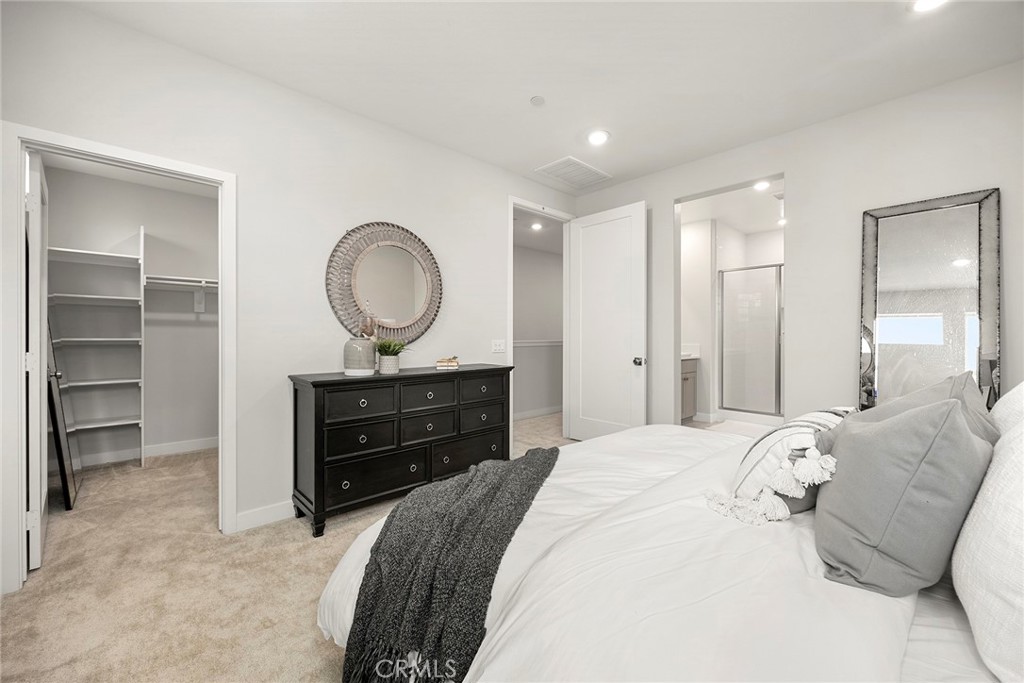 125 Pattern Irvine, CA 92618 - Photo 30 of 38 a bedroom with a bed and a dresser