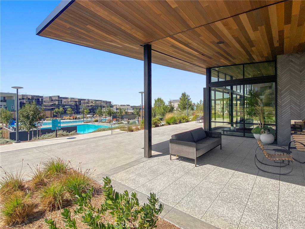125 Pattern Irvine, CA 92618 - Photo 37 of 38 a building outdoor space with patio furniture and potted plants