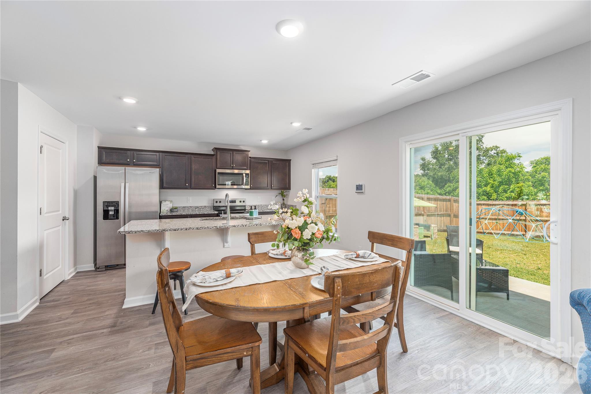8 Madelyn Drive Clyde, NC 28721 - Photo 13 of 43 a dining room with furniture and a floor to ceiling window