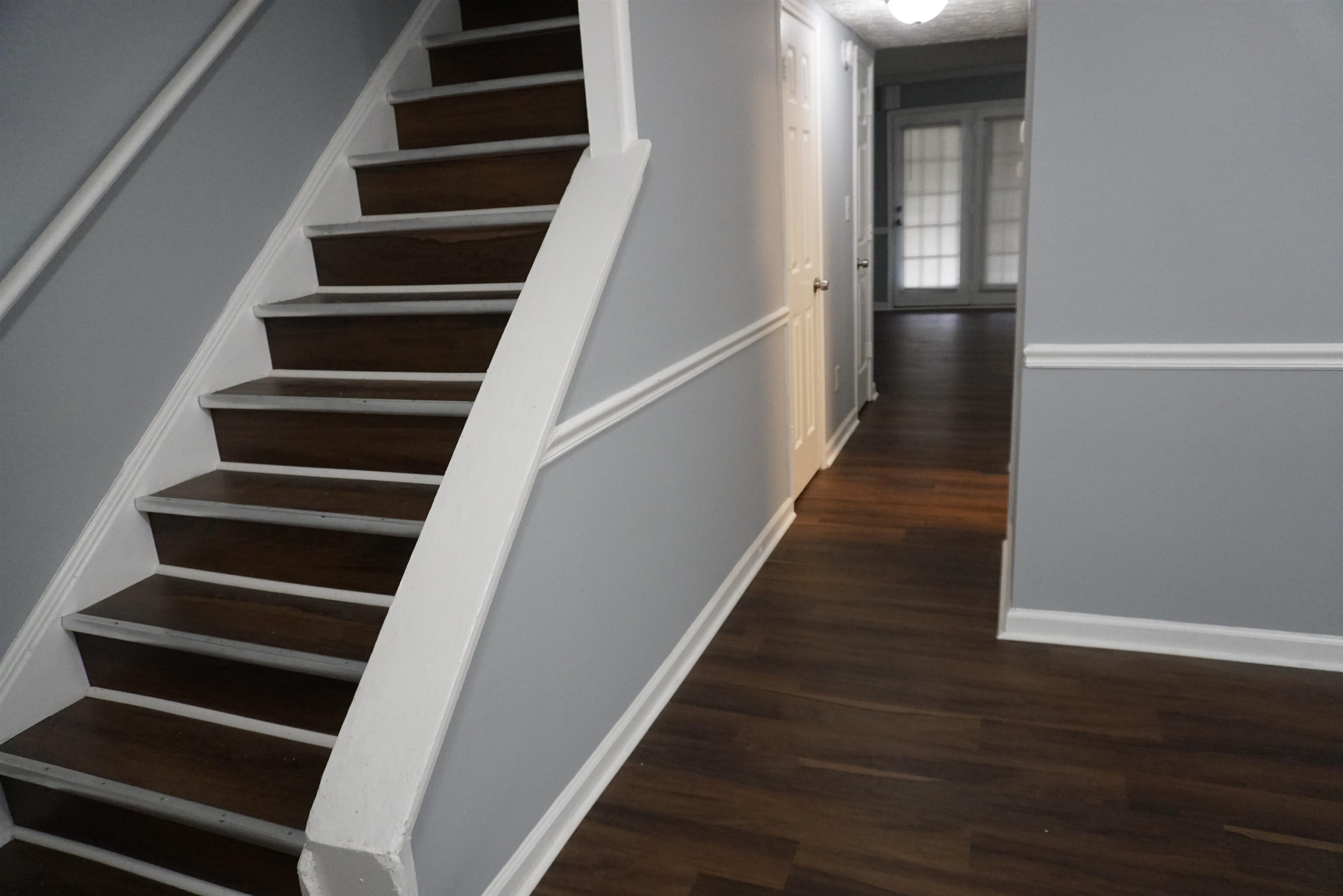 5489 South Park Place Atlanta, GA 30349 - Photo 21 of 37 wooden view of entryway with wooden floor